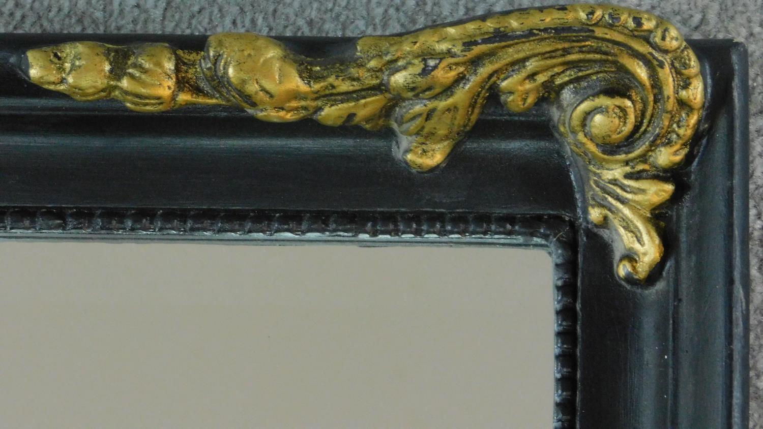 A rococo style gilt and ebonised pier mirror. 115x52cm - Image 2 of 4