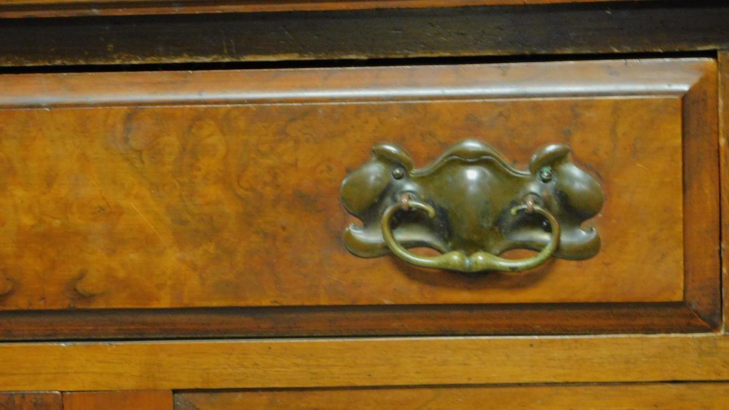 A late Victorian carved walnut sideboard fitted drawers and cupboards on bracket feet. H.94 W.137 - Image 7 of 8