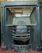 A 19th century cast iron fire insert. H.96 W.78cm