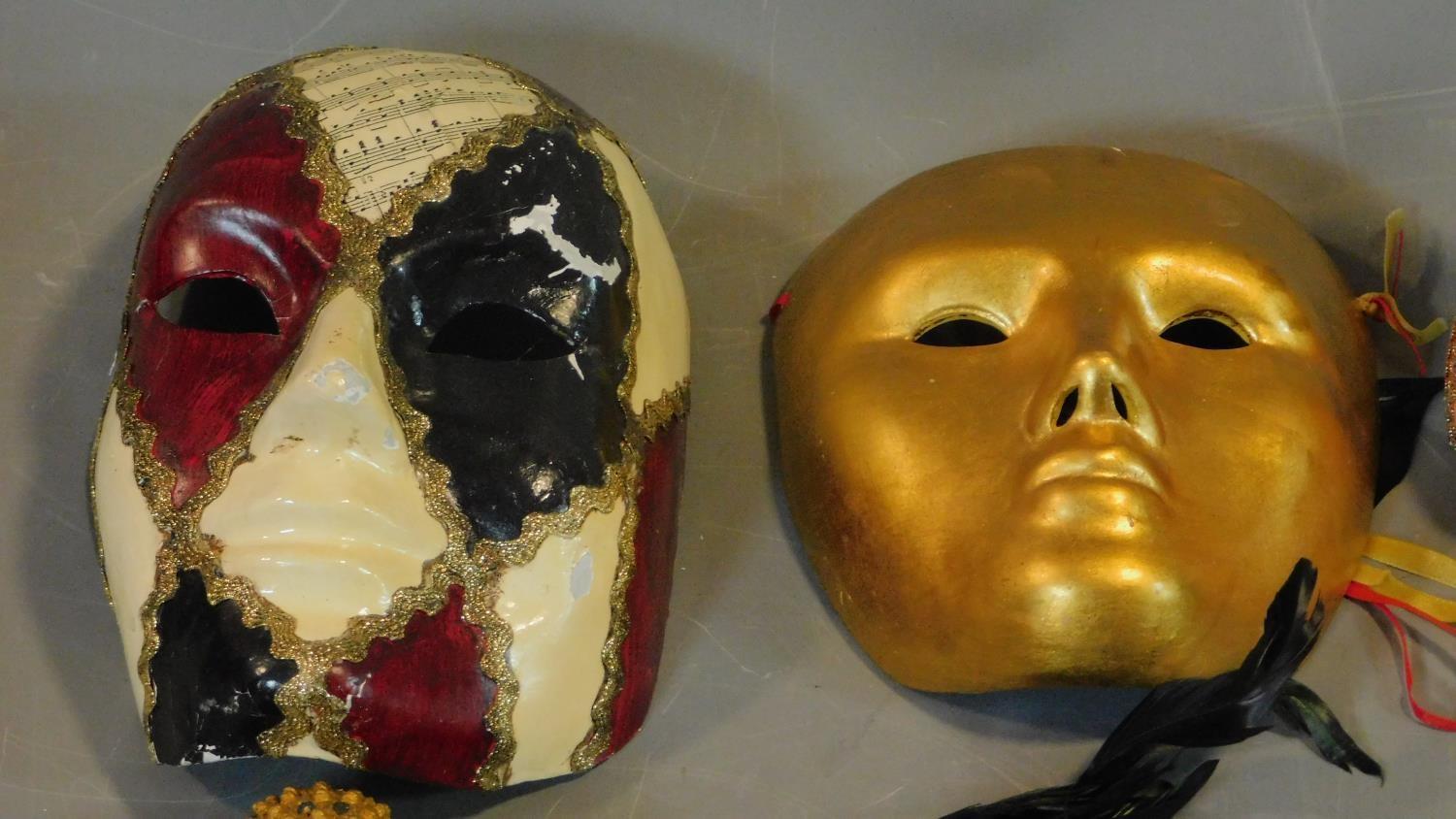 A collection of eight Venetian and other masks. - Image 2 of 4