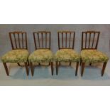 A set of four 19th century Hepplewhite style mahogany dining chairs with stuffover floral