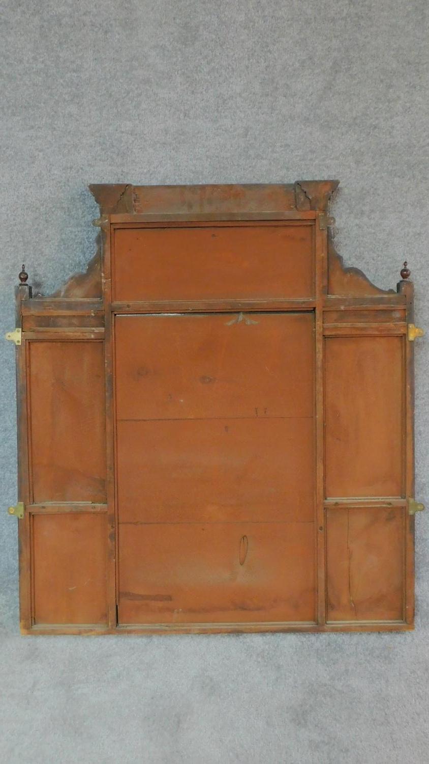 A Victorian carved walnut overmantel with broken arch pediment. H.135 W.111 D.16cm - Image 6 of 6