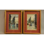 A pair of framed and glazed oils on board, continental street scenes in the rain, signed T