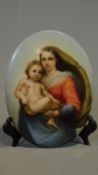 A hand painted on porcelain plaque, Madonna and child 20x15cm