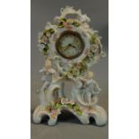 A Meissen style dressing table clock. H.27cm