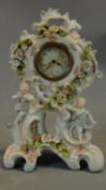 A Meissen style dressing table clock. H.27cm