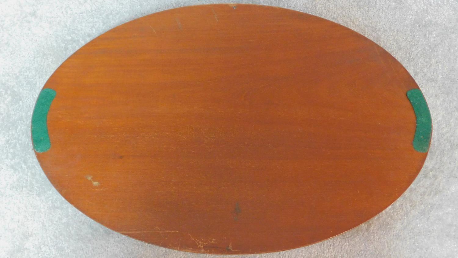 A late 19th century oval mahogany and marquetry inlaid tray with twin brass carrying handles. W.67 - Image 4 of 5