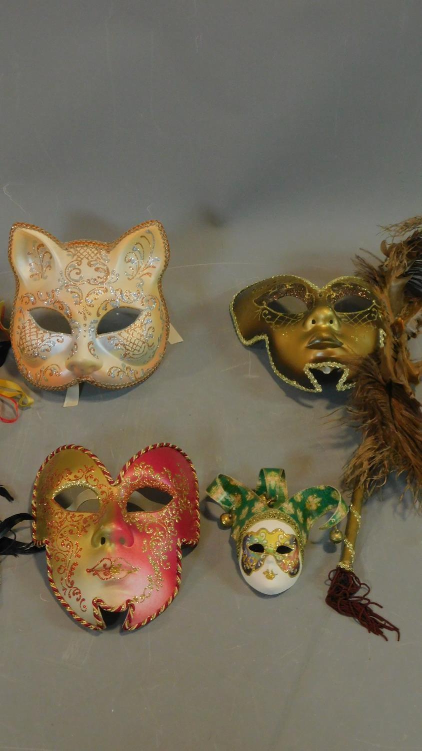 A collection of eight Venetian and other masks. - Image 4 of 4