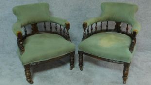 A pair of late 19th century carved and stained beech tub armchairs. H.77cm