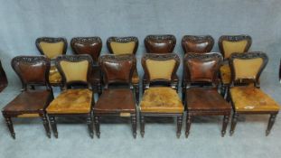 A set of twelve William IV mahogany dining chairs with carved shaped and leather upholstered backs