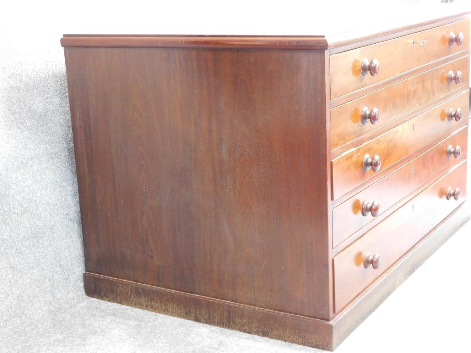 A mid Victorian style mahogany plan chest of five long drawers on plinth base. H.77 W.117 D.80cm - Image 2 of 8