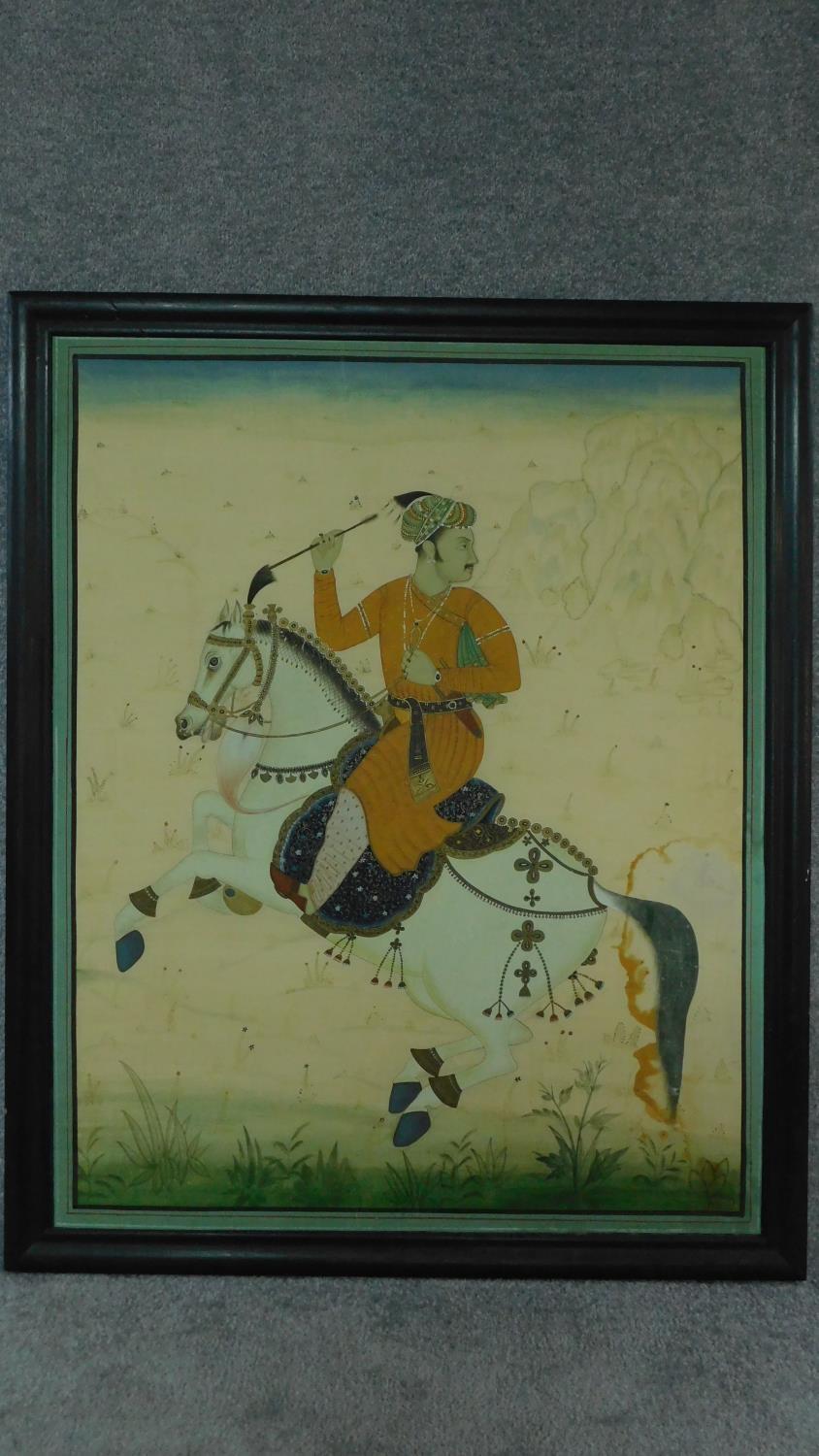 A framed Indian equestrian painting on silk, horseman on Rajasthan Marwari. h118x96cm