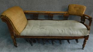A late Victorian carved beech chaise longue frame. H.74 W.164 D.62cm