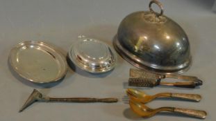 A silver plated meat dish cover, tureens, servers and a candle snuffer.