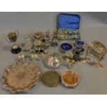 A miscellaneous collection of silver plated items, to include; pair candlesticks, embossed tray,