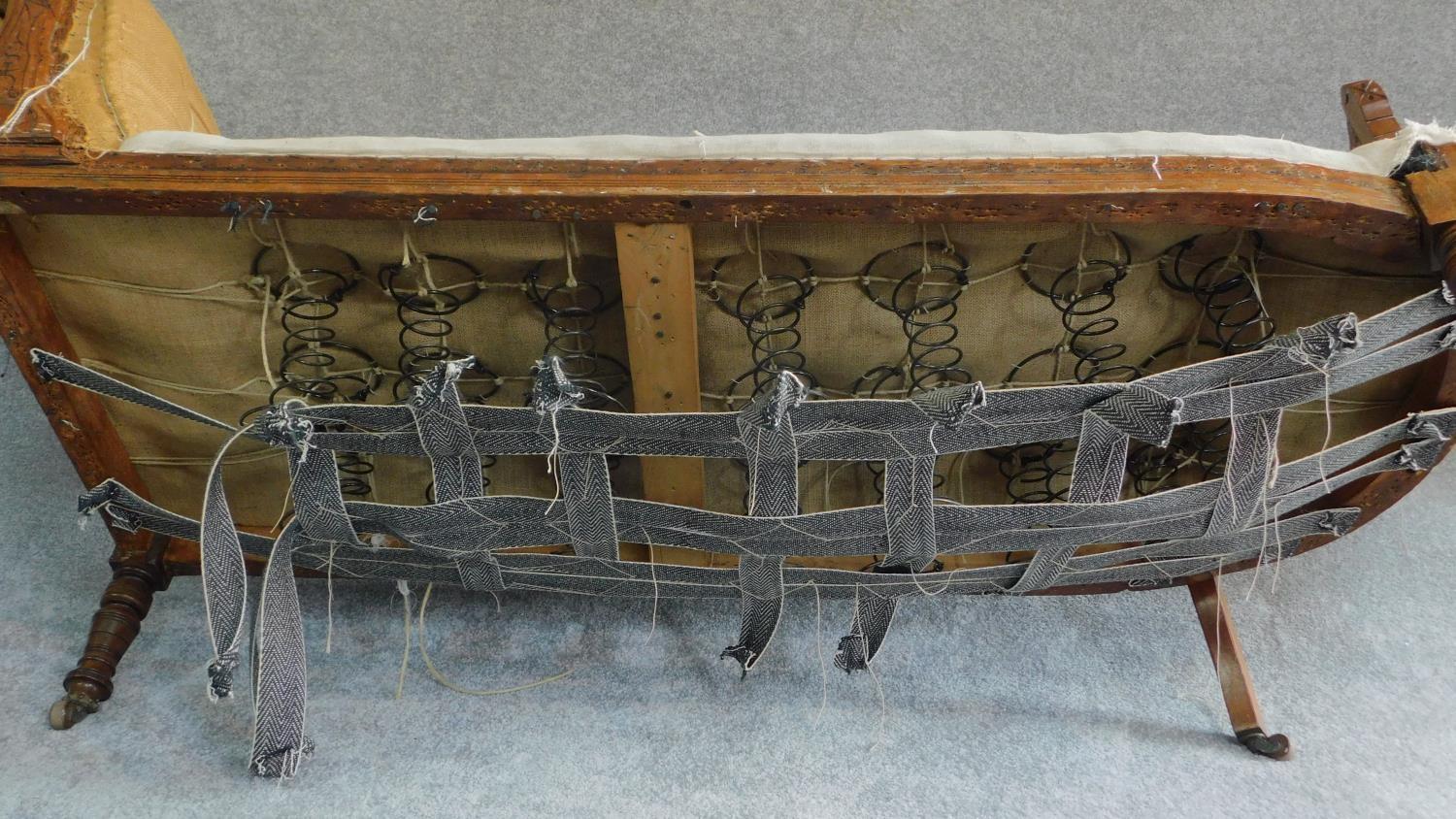 A late Victorian carved beech chaise longue frame. H.74 W.164 D.62cm - Image 7 of 7