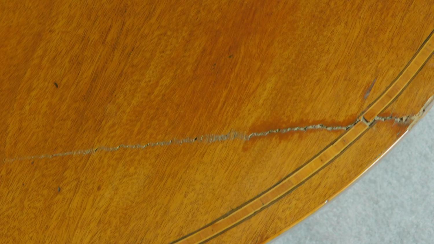 A Georgian mahogany and boxwood strung demi lune card table on square tapering supports. H.74 W.91 - Image 5 of 5