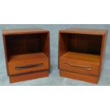 A pair of mid 20th century teak bedside cabinets. H.53 W.46 D.41cm