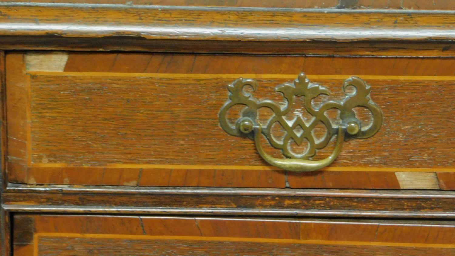 A Georgian country oak lowboy with mahogany crossbanding and satinwood stringing, two short over - Image 5 of 8