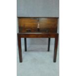 A Georgian mahogany box on stand with brass hinged lid, fitted two frieze drawers. H.76 W.46 D.75 (