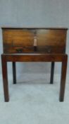 A Georgian mahogany box on stand with brass hinged lid, fitted two frieze drawers. H.76 W.46 D.75 (