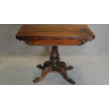 A Victorian rosewood card table on carved bulbous base on quadruped cabriole supports. H.74 W.92 D.