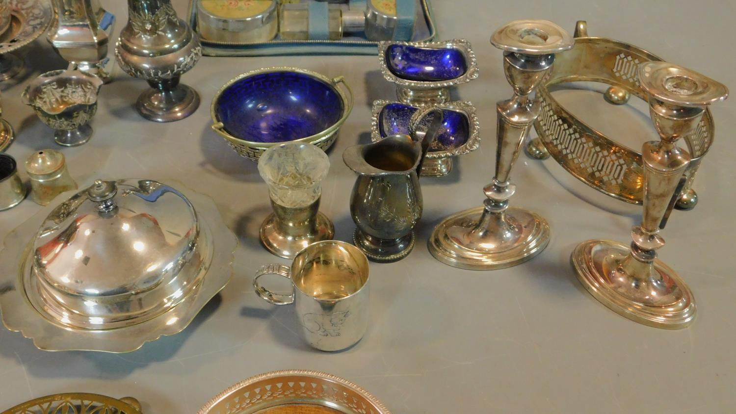 A miscellaneous collection of silver plated items, to include; pair candlesticks, embossed tray, - Image 4 of 6