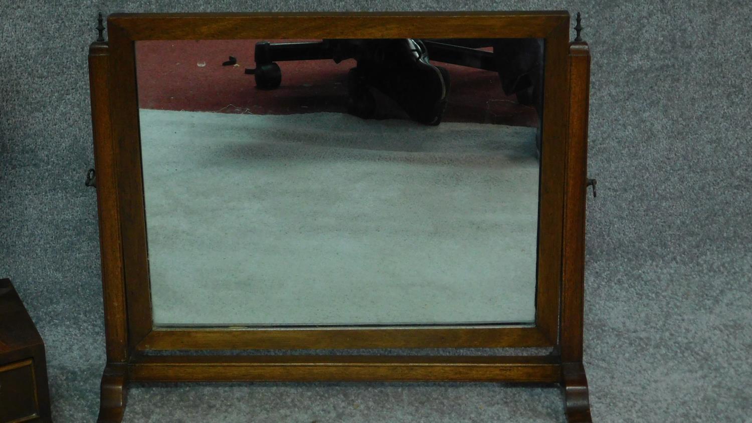 A Georgian style mahogany swing mirror with fitted base and a similar Edwardian oak mirror. H.64cm - Image 2 of 5