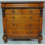 A Victorian mahogany chest fitted secret frieze drawer above two short and three long drawers with