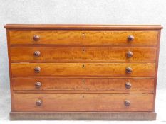 A mid Victorian style mahogany plan chest of five long drawers on plinth base. H.77 W.117 D.80cm