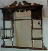 A Victorian carved walnut overmantel mirror with original bevelled plates. H.142 W.149 D.20cm