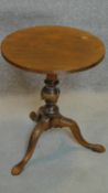 A 19th century mahogany circular occasional table on tripod cabriole base. H.56cm