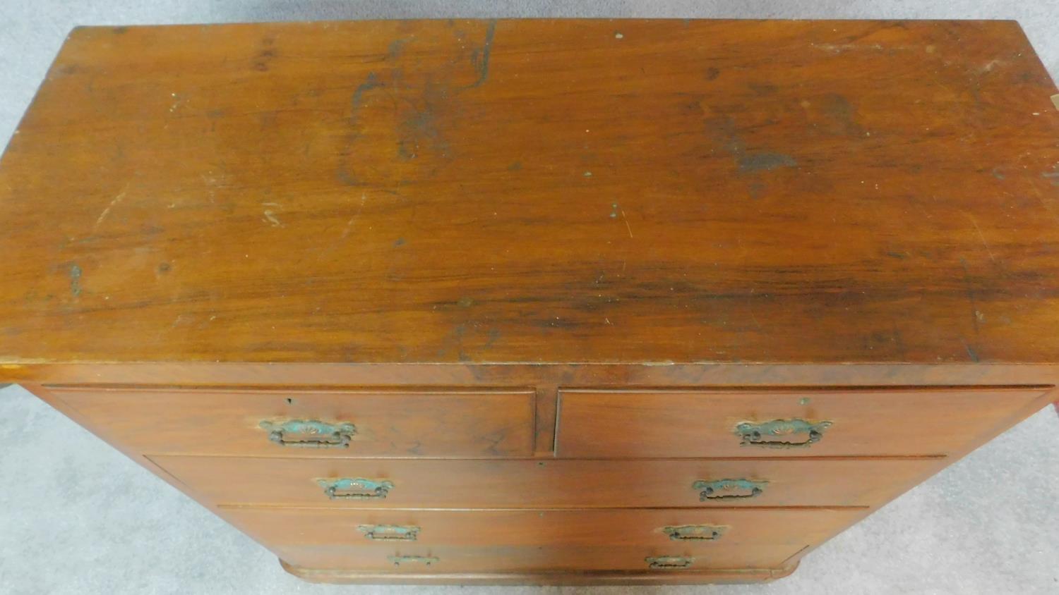 A Victorian walnut chest of 2 short over three long drawers fitted original brass handles. H.118 W. - Image 5 of 9