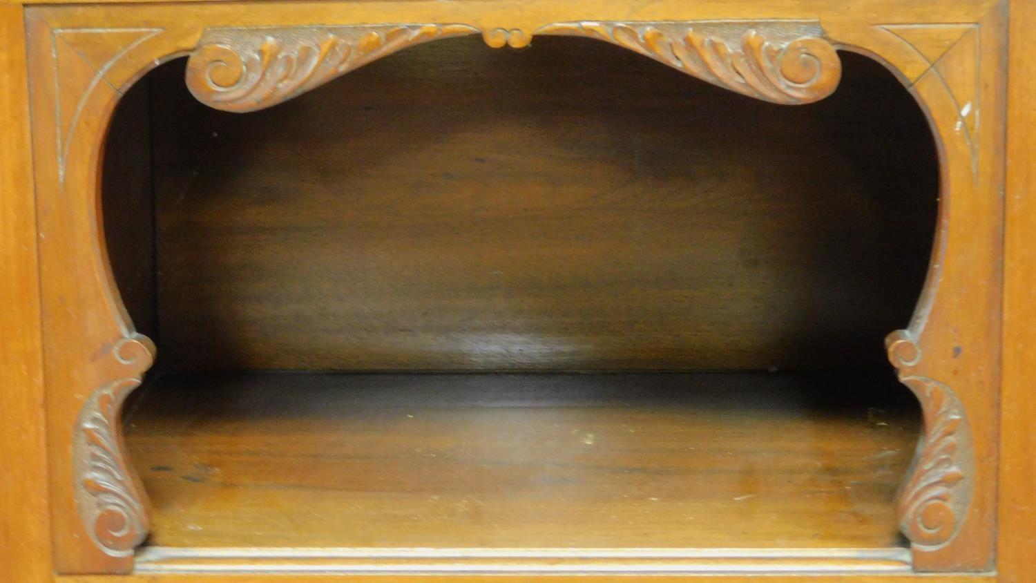 A late Victorian carved walnut sideboard fitted drawers and cupboards on bracket feet. H.94 W.137 - Image 6 of 8