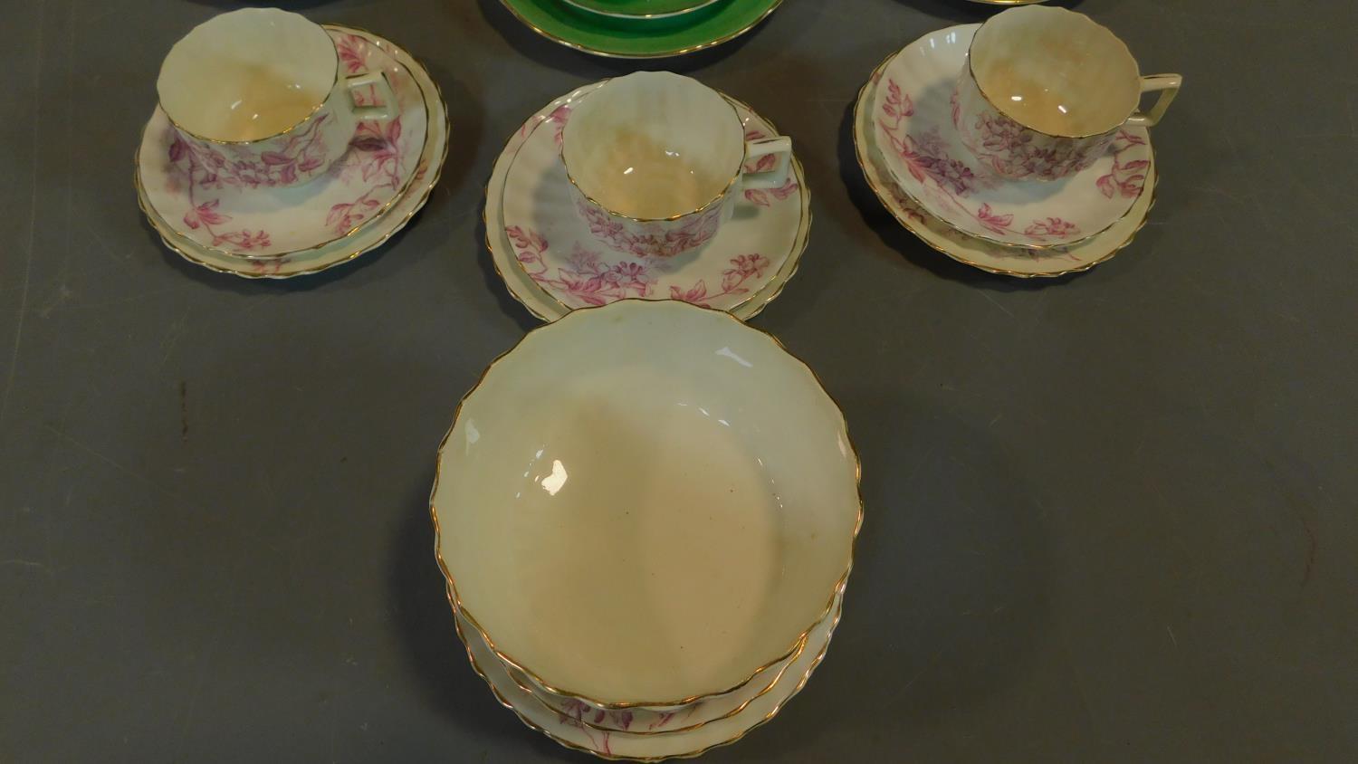 A green floral decorated tea set for six and a seven piece pink floral tea set. - Image 3 of 9