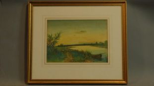 A framed and glazed watercolour, sheep on a path and boat in a riverscape, indistinctly signed.