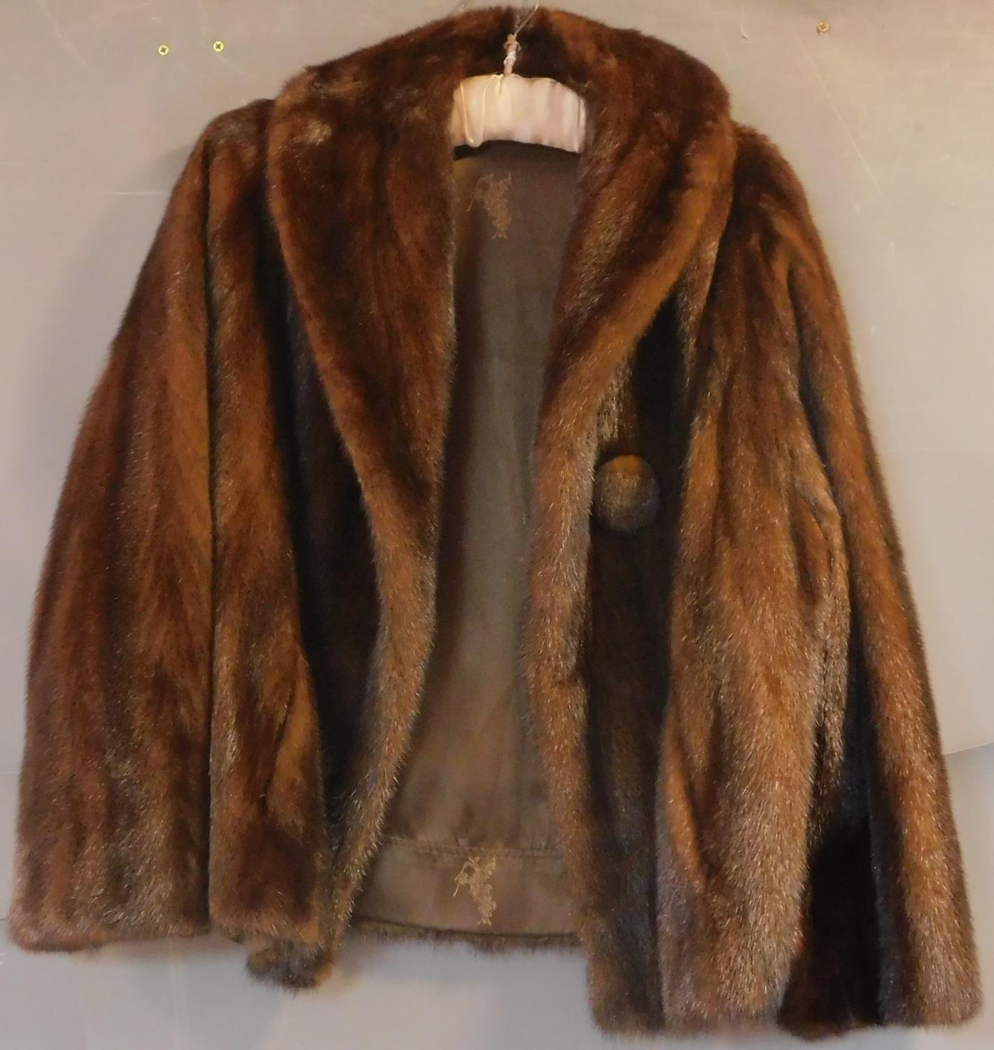 A medium size bespoke tailored mink fur coat. (good original condition)