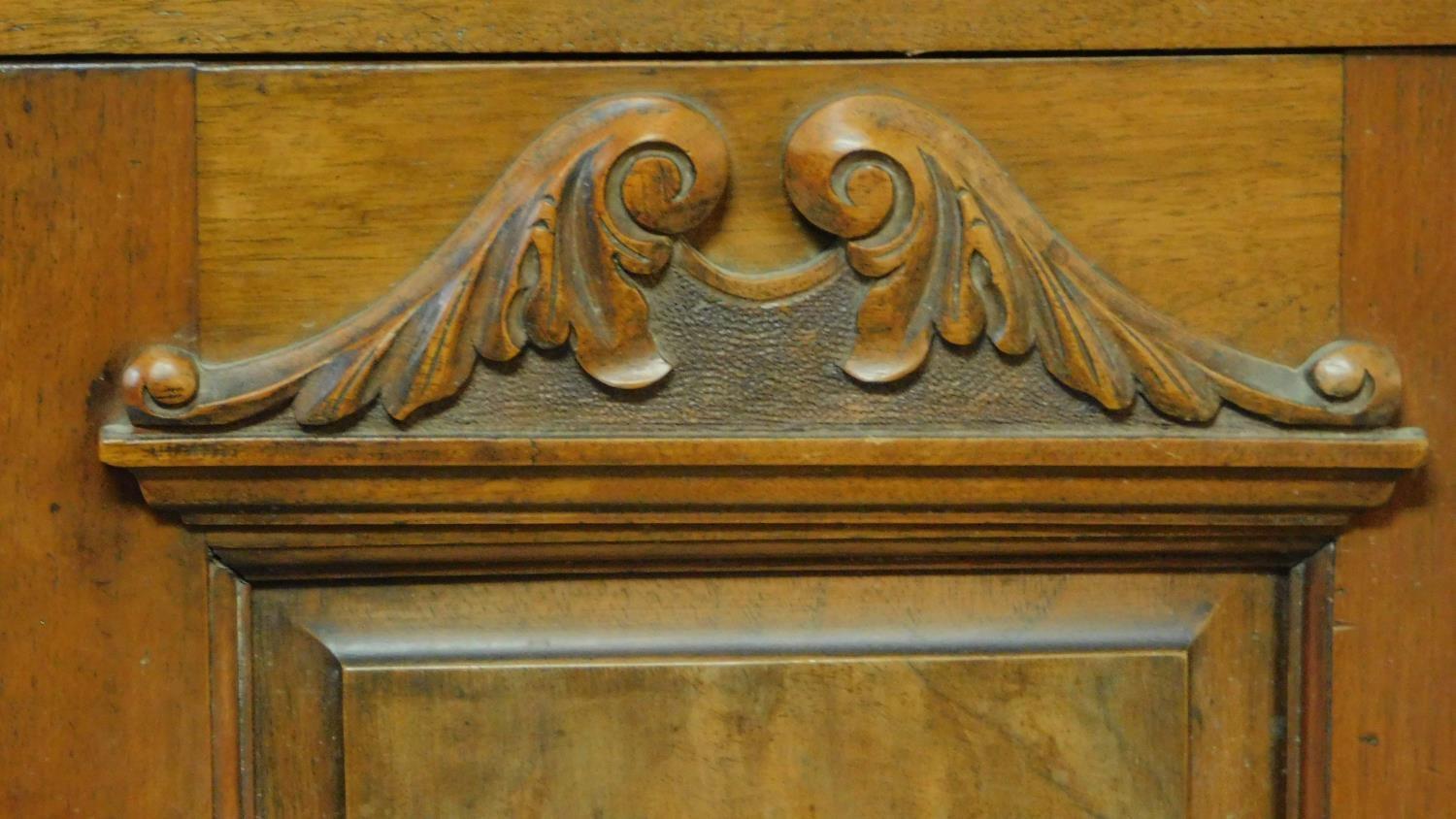 A late Victorian carved walnut sideboard fitted drawers and cupboards on bracket feet. H.94 W.137 - Image 5 of 8