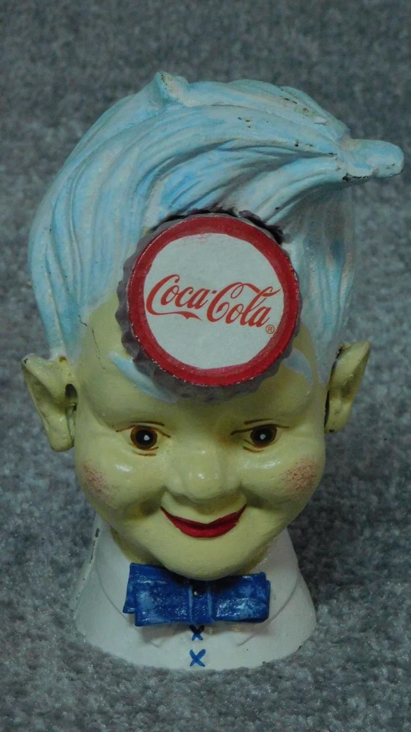 A painted metal Uncle Sam money box and another similar advertising Coca Cola. H.28cm - Image 2 of 3