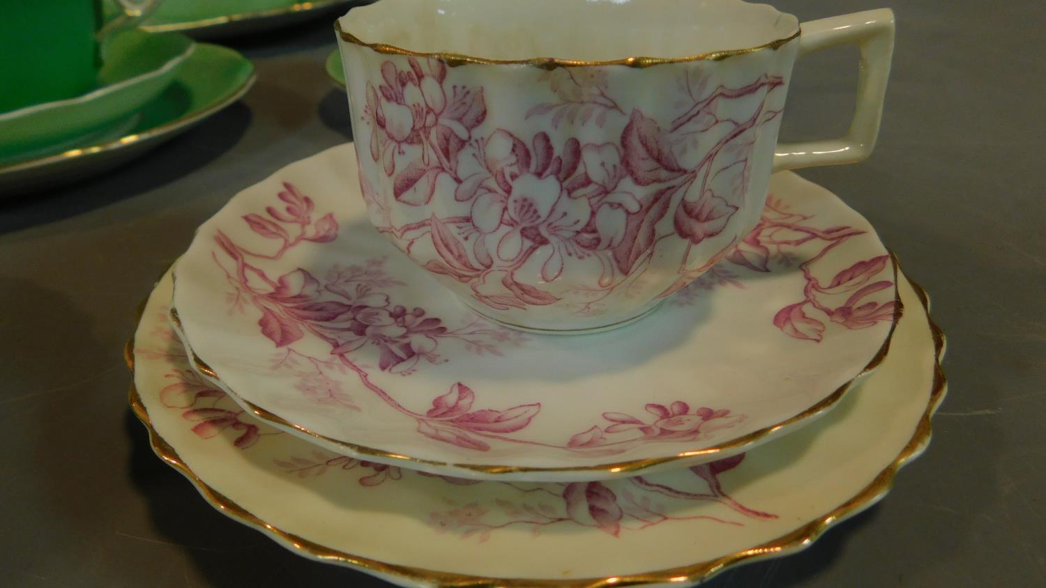 A green floral decorated tea set for six and a seven piece pink floral tea set. - Image 5 of 9