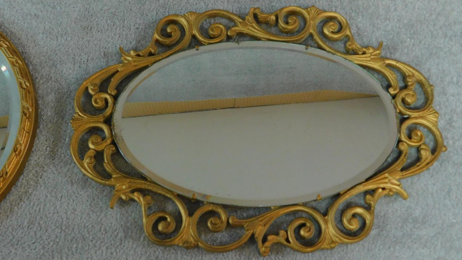 A rectangular gilt wall mirror and two oval gilt mirrors. 120x34cm - Image 2 of 5