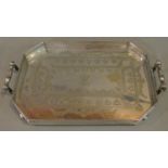 A heavy Victorian silver plated tray with pierced gallery and floral engraving. 65x39cm