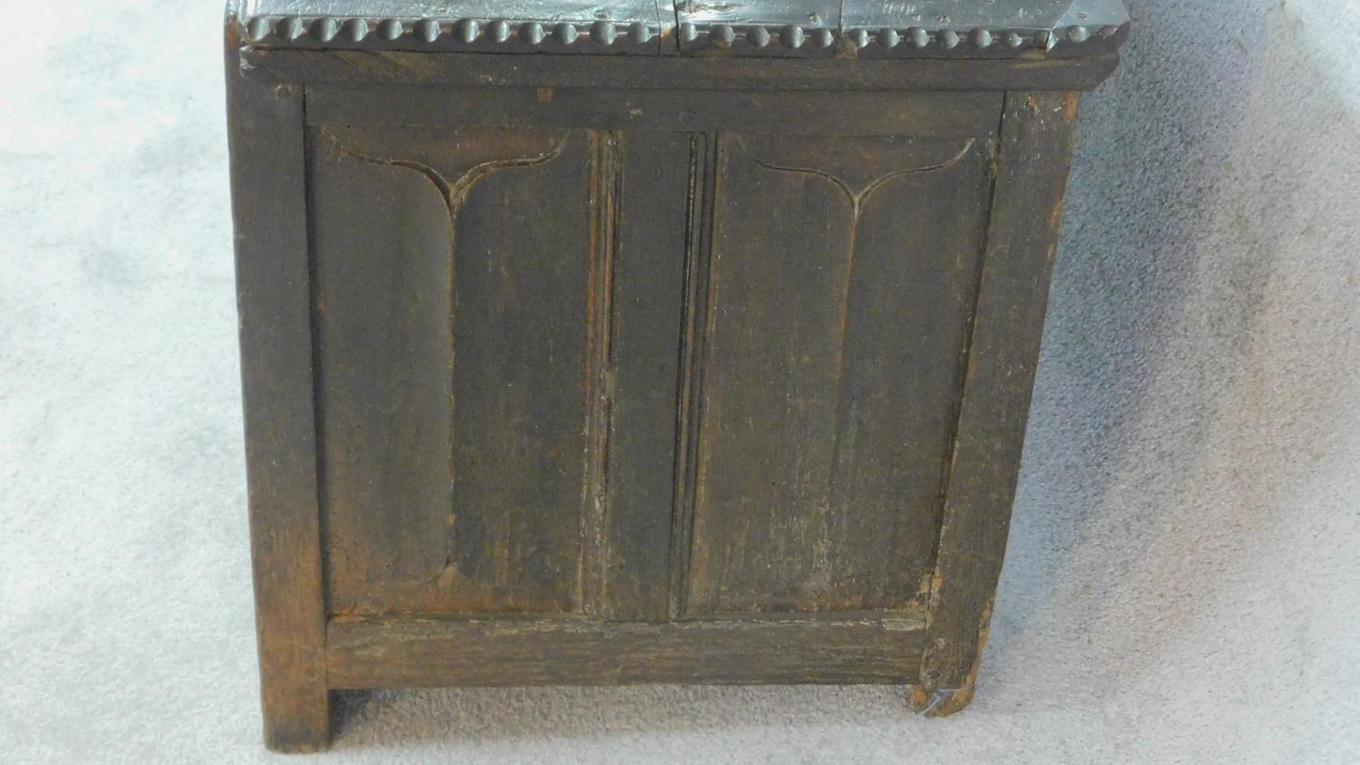 An early 17th century oak coffer with linenfold panels and hinged lidded top on block feet. H.62 W. - Image 5 of 10