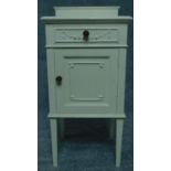 A mid 20th century painted pot cupboard with Adam style swag decoration. H.84 W.41 D.39cm
