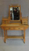 A Victorian Ash aesthetic style dressing table on turned stretchered supports united by undertier.