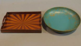 A papier mache painted and gilded bowl and an starbust inlaid tray. 35x35 (bowl)