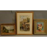 A framed and glazed watercolour, cathedral by a river, and two framed oil paintings, still life