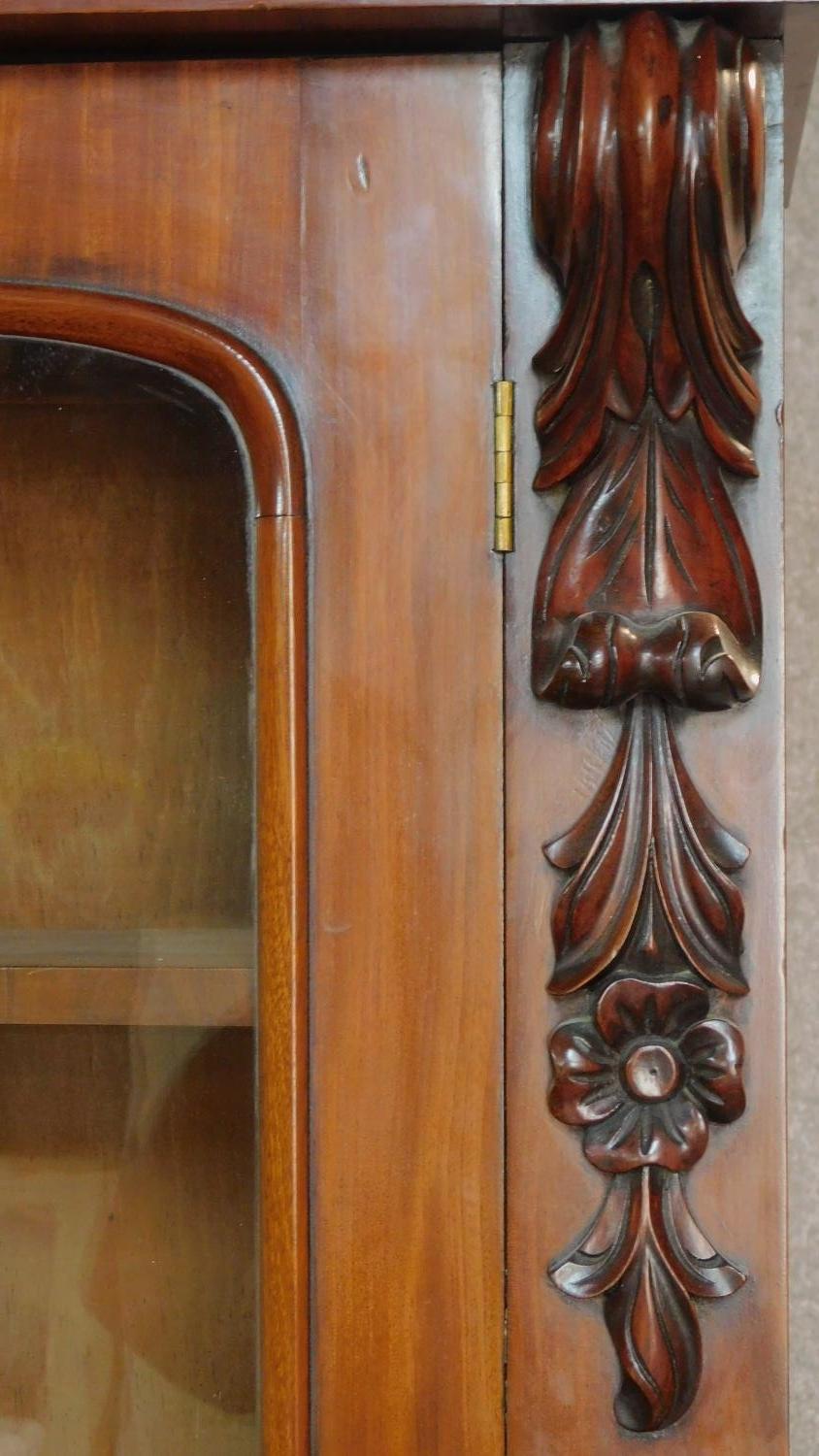 A mid Victorian mahogany two section library bookcase, the upper glazed section above well fitted - Image 6 of 12