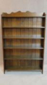 A mid 20th century oak open bookcase. 140x91cm