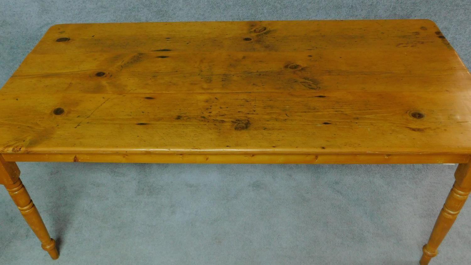 A 19th century pine/Yellowwood planked top refectory dining table on turned tapering supports. - Image 3 of 4